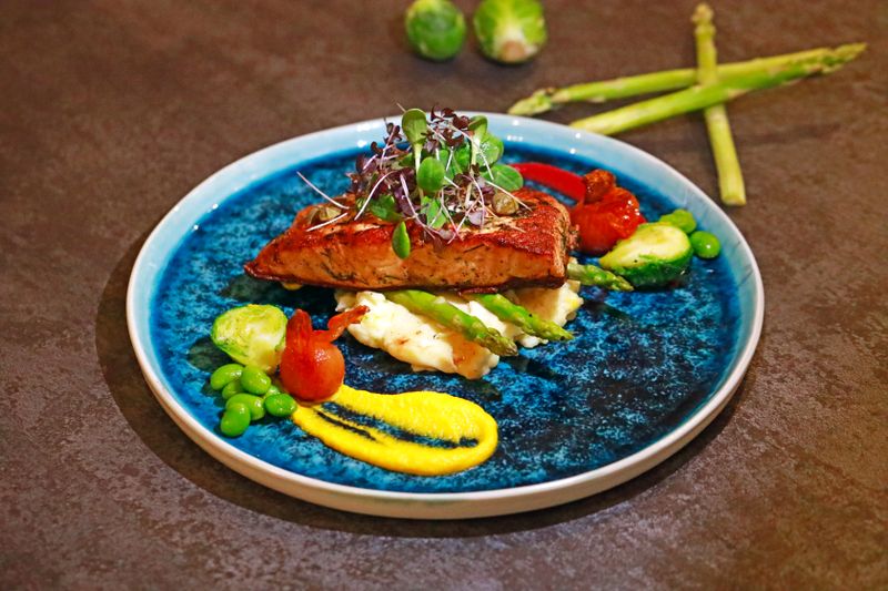 Pan-seared salmon with lemon butter sauce and asparagus