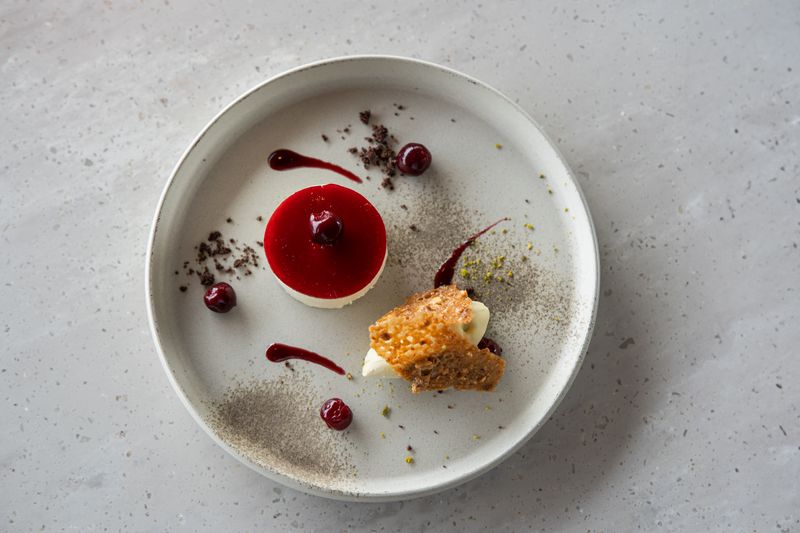 Creamy panna cotta with fresh berry coulis