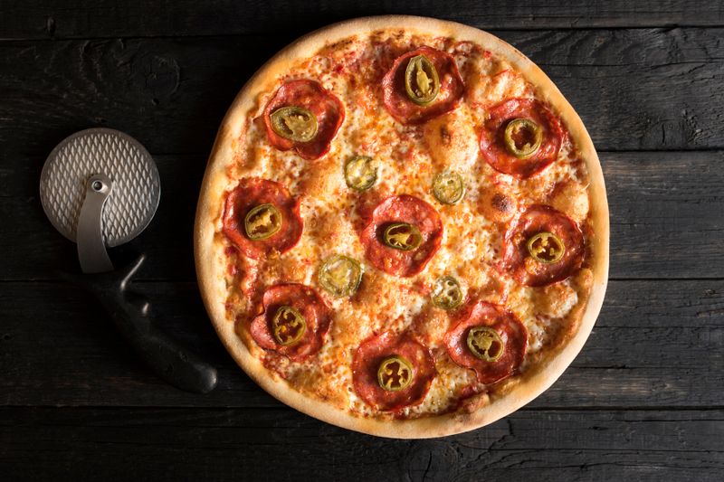 Spicy Diavola pizza with hot salami and chili flakes