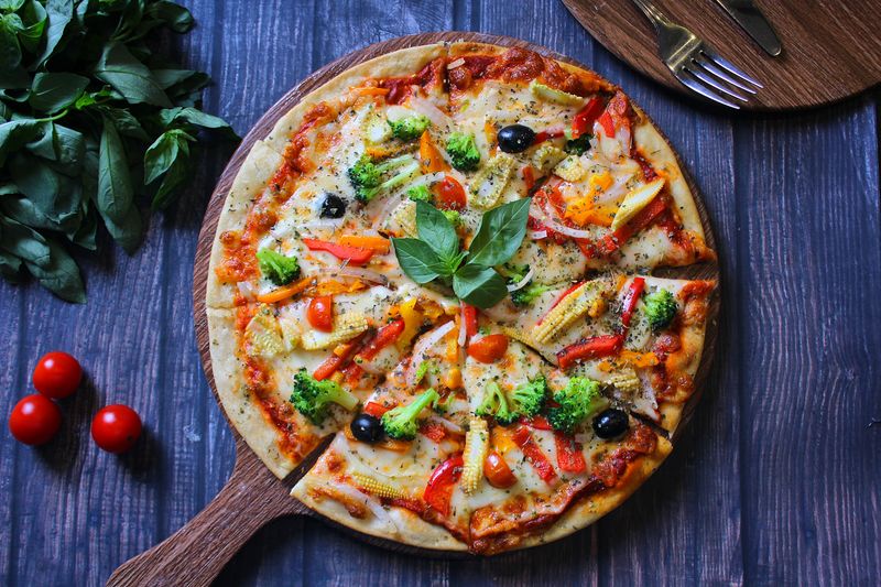 BBQ Chicken marco pizza with caramelized onions and smoky sauce