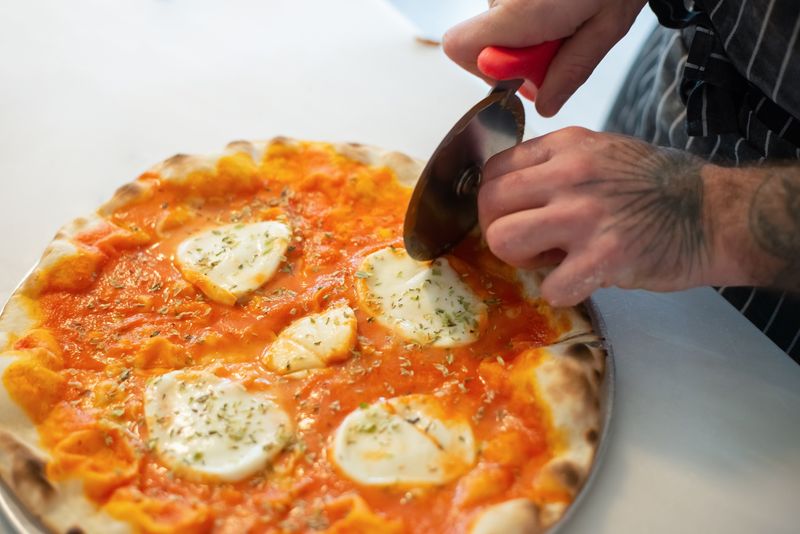 Classic Margherita marco's pizza with fresh basil and mozzarella
